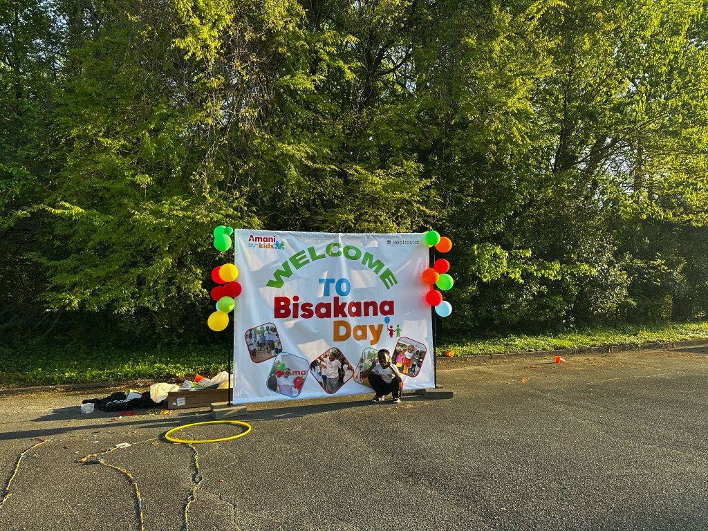 Welcome to Bisakana Day banner with festive balloons and happy children